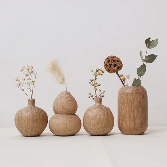 What influence does the material of a vase have on flower arrangement?cid=6