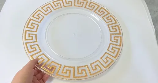 round golden ripple clear plastic charger plate