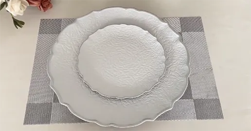 scalloped white plate
