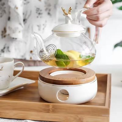 Modern black gift box luxury porcelain cup saucer heating base sets ceramic tea set with glass teapot