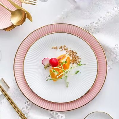 Gold rim pink ceramic dishes dinnerware sets 12pcs color glaze light luxury ceramic plates and bowls set