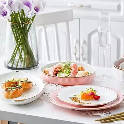 Gold rim pink ceramic dishes dinnerware sets 12pcs color glaze light luxury ceramic plates and bowls set